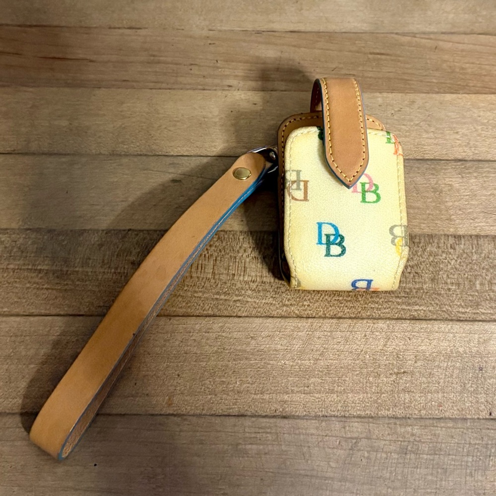 Dooney & Bourke Cream Canvas & Vachetta Leather Wristlet Phone Case - Picture 1 of 6